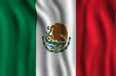 Mexican Flag - Mexico City is the seat of the Mexican Federal Government. Mexico City has so much history and culture making it a great place to visit in Mexico this winter.