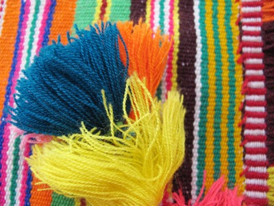 Colorful blankets are only one of the handmade crafts you'll find in Oaxaca City, Mexico, which is a great place to visit this winter. 